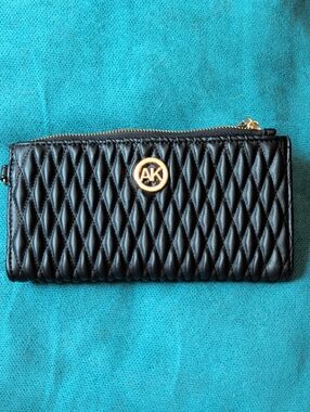 Anne Klein Black Quilted Zip Wallet with Gold AK Emblem